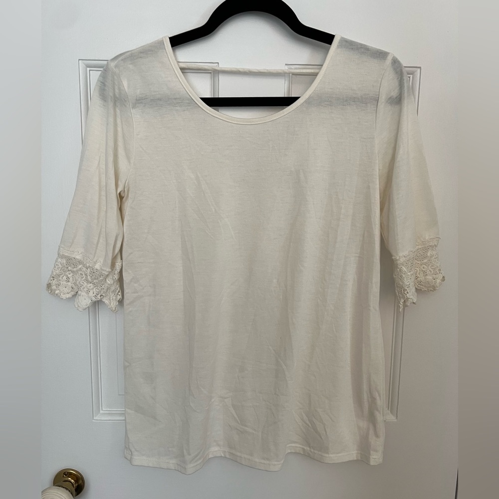 Charming Charlie Cream Shirt with lace sleeves and low back